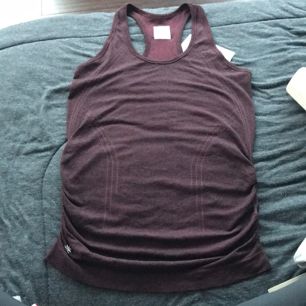 Burgundy heathered tank. Hip length. Stretchy.